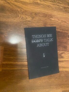 Things We Don't Talk About — Black Paperback Book